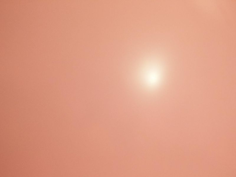 Minimalist training space with soft pink ambient light